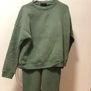 Green sweatshirt and sweatpants track set